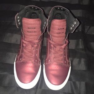 SUPRA high top sneakers.